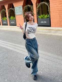 Әдемі джинсы киген бөксенің фотосы